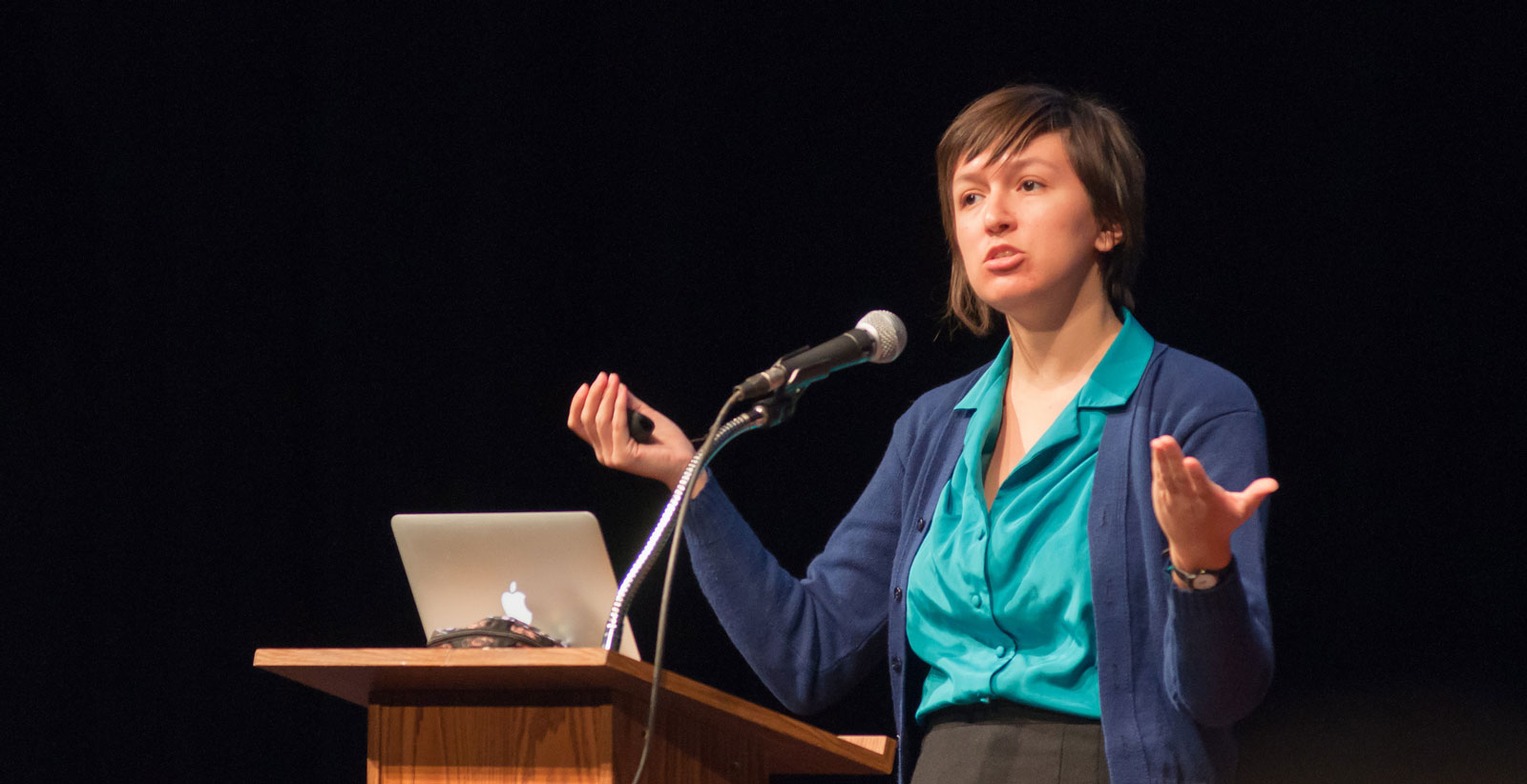 Catherine Farman giving a talk on stage